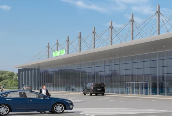 Katowice: Trwa montaż systemu taśmociągów w terminalu. Budynek prawie gotowy